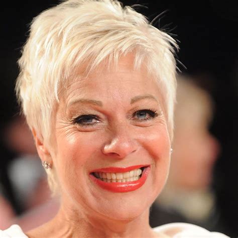 15: Short Grey Hair. A long, messy pixie is a stylish choice for women over 60 with short, curly grey hair. The longer length of the pixie cut allows more room for the curls to move freely, and the messiness adds a youthful and carefree vibe. Source.